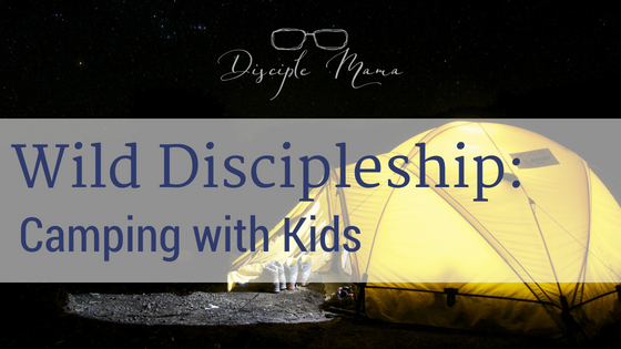 Yellow tent lighted up from the inside with text overlay: Wild Discipleship: Camping with Kids