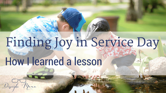 Two toddler boys playing by a creek with text overlay: Finding Joy in Service Day - How I Learned a Lesson